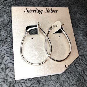 Sterling silver long hoop earrings.